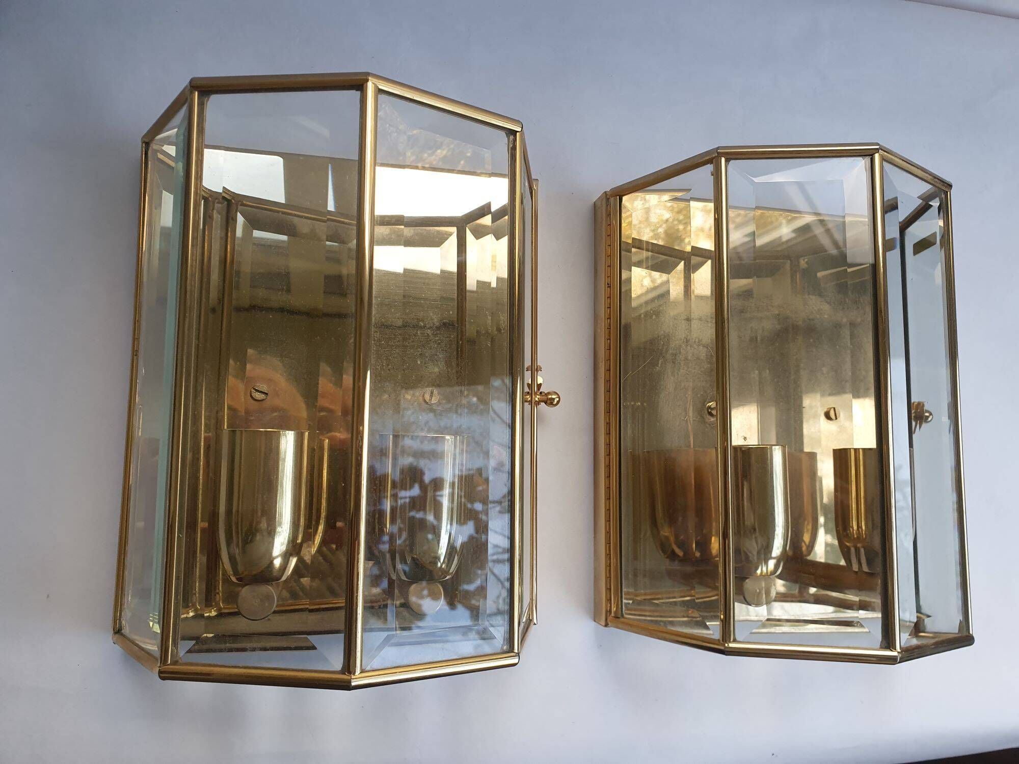 Pair of Italian gold-plated brass wall sconces with beveled glass