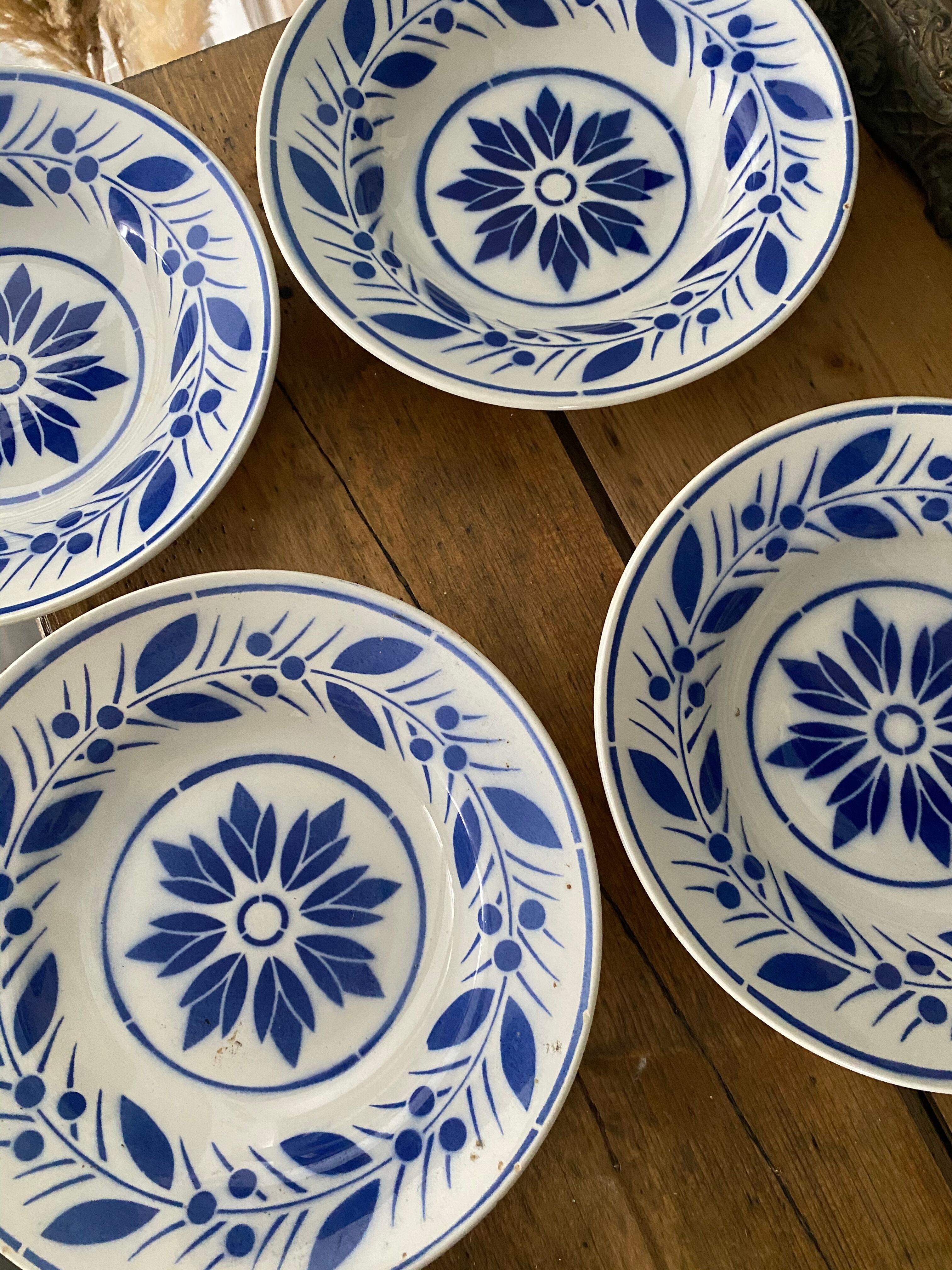 Lot of 4 blue hollow plates