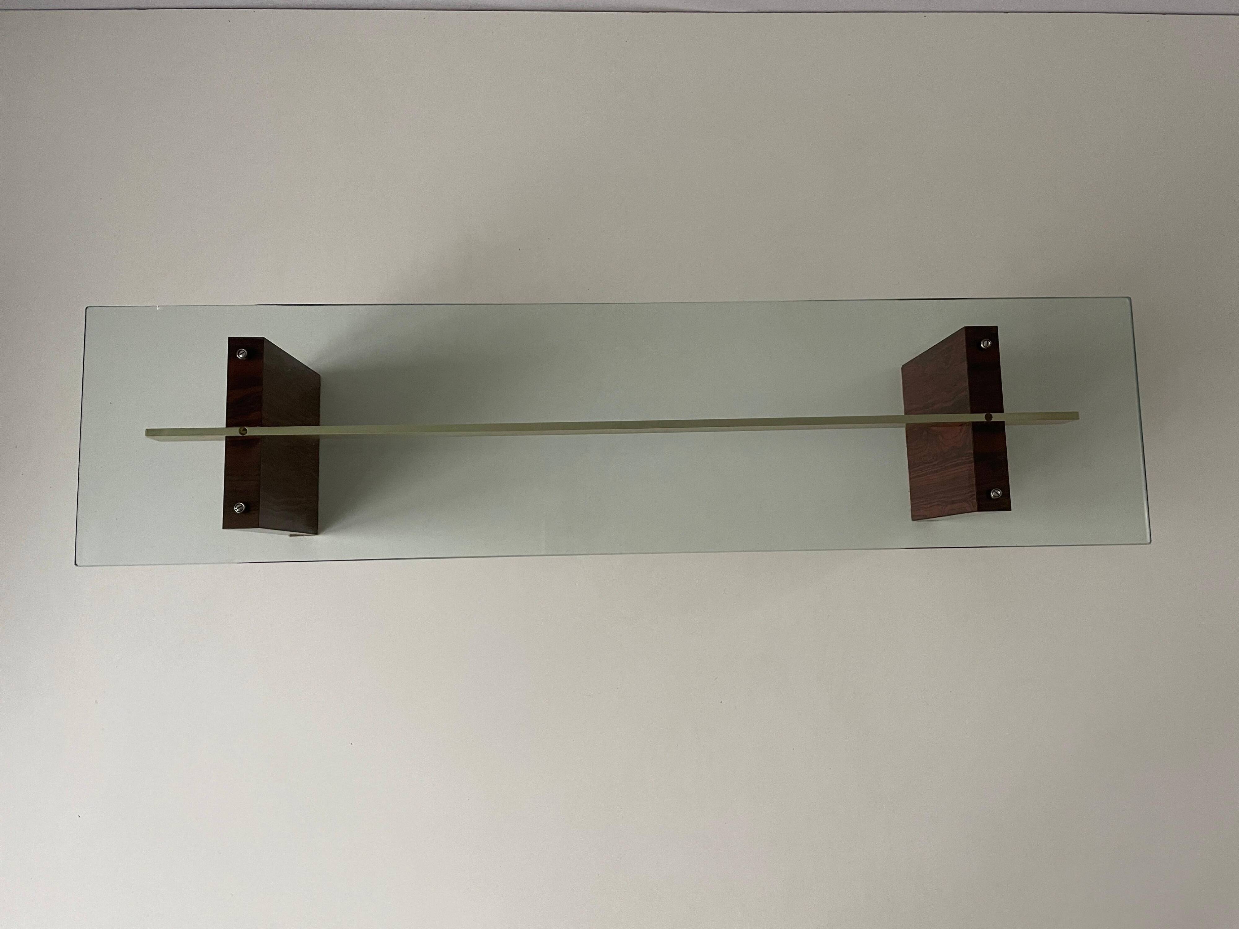Mid-century minimalist thick glass coffee table, rosewood legs, 1960, Germany.