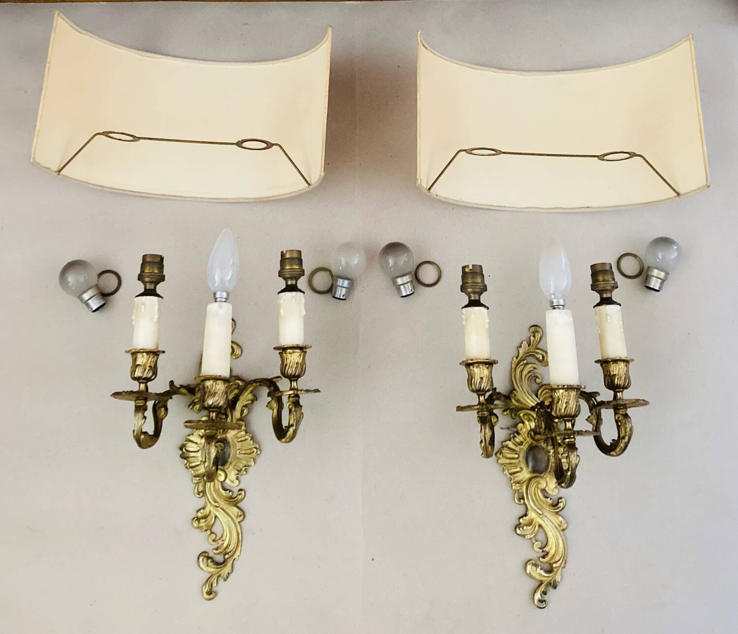 Louis XV gilt bronze wall lights from the 19th century with lampshades