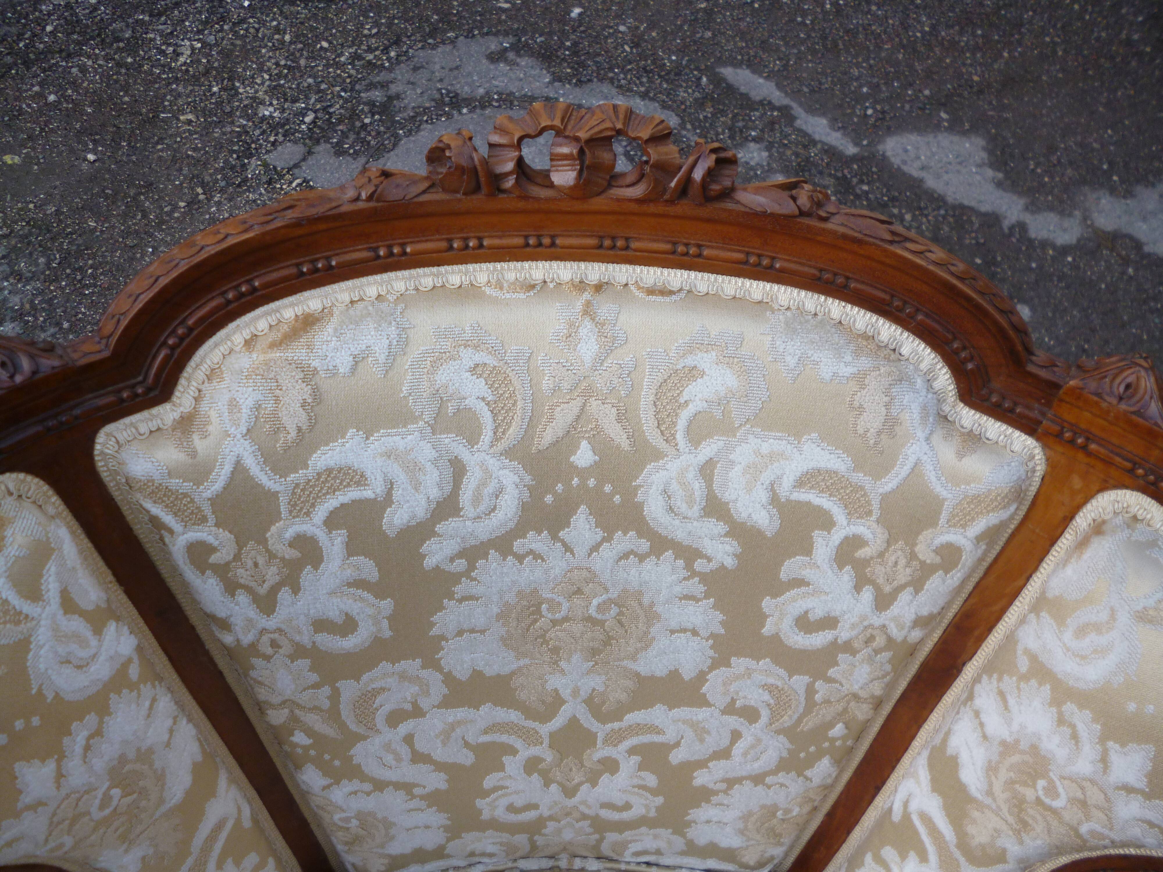 Pair of Louis XVI style armchairs with ears