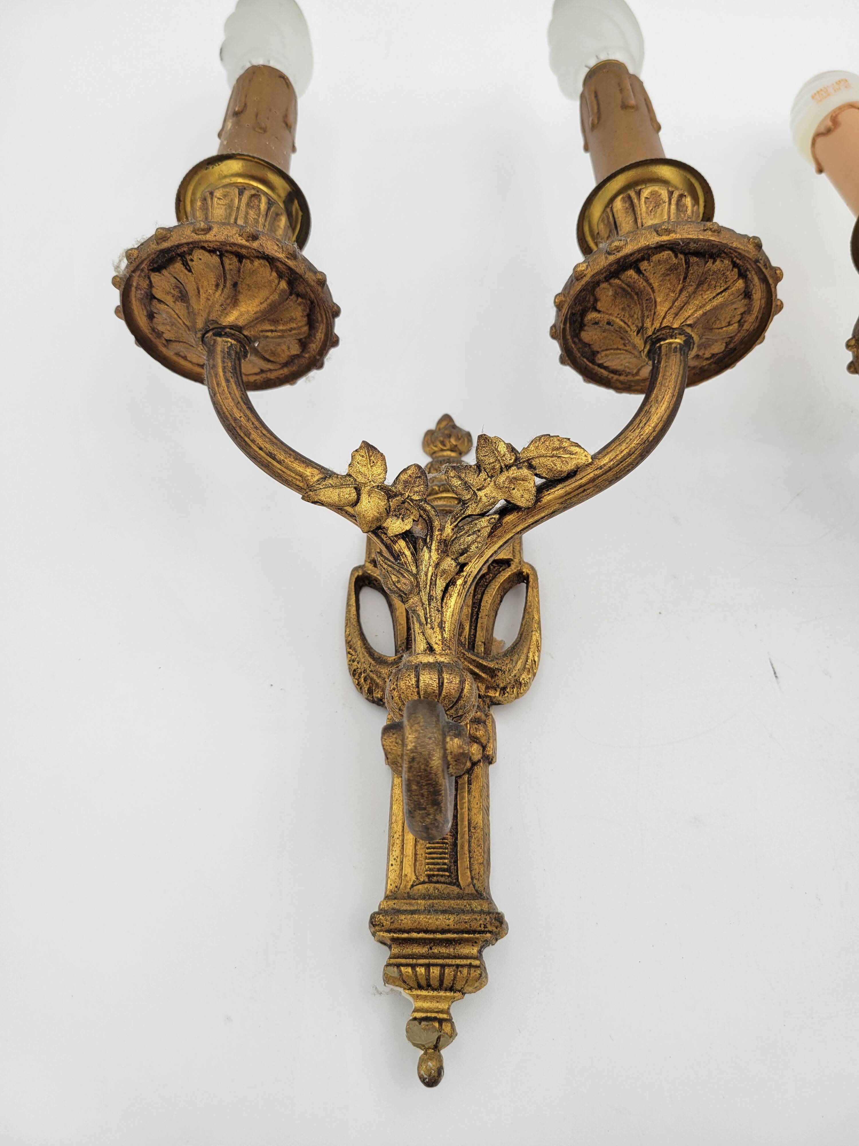 Antique Louis XVI style bronze wall lights