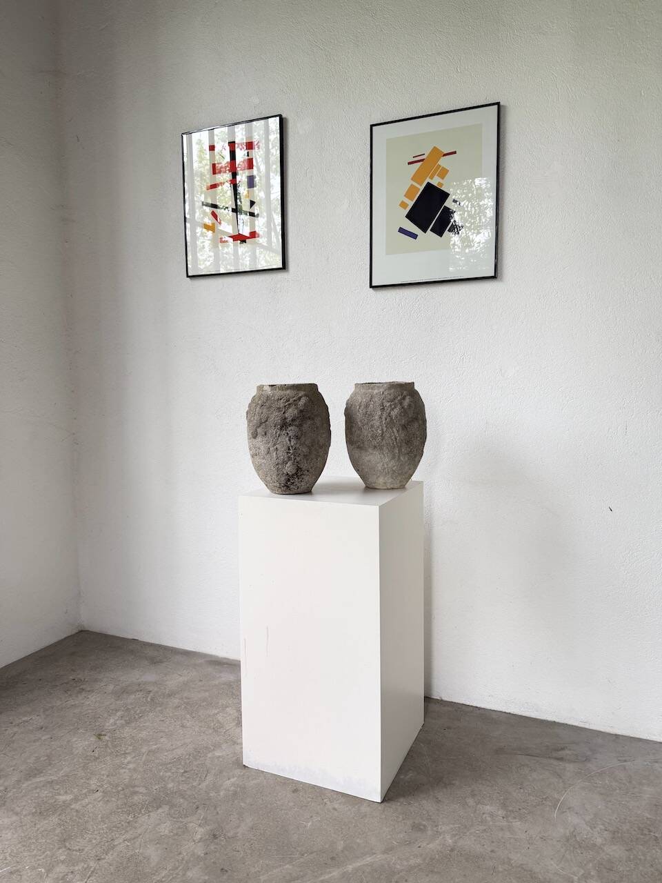 Pair of cement planters, 1900