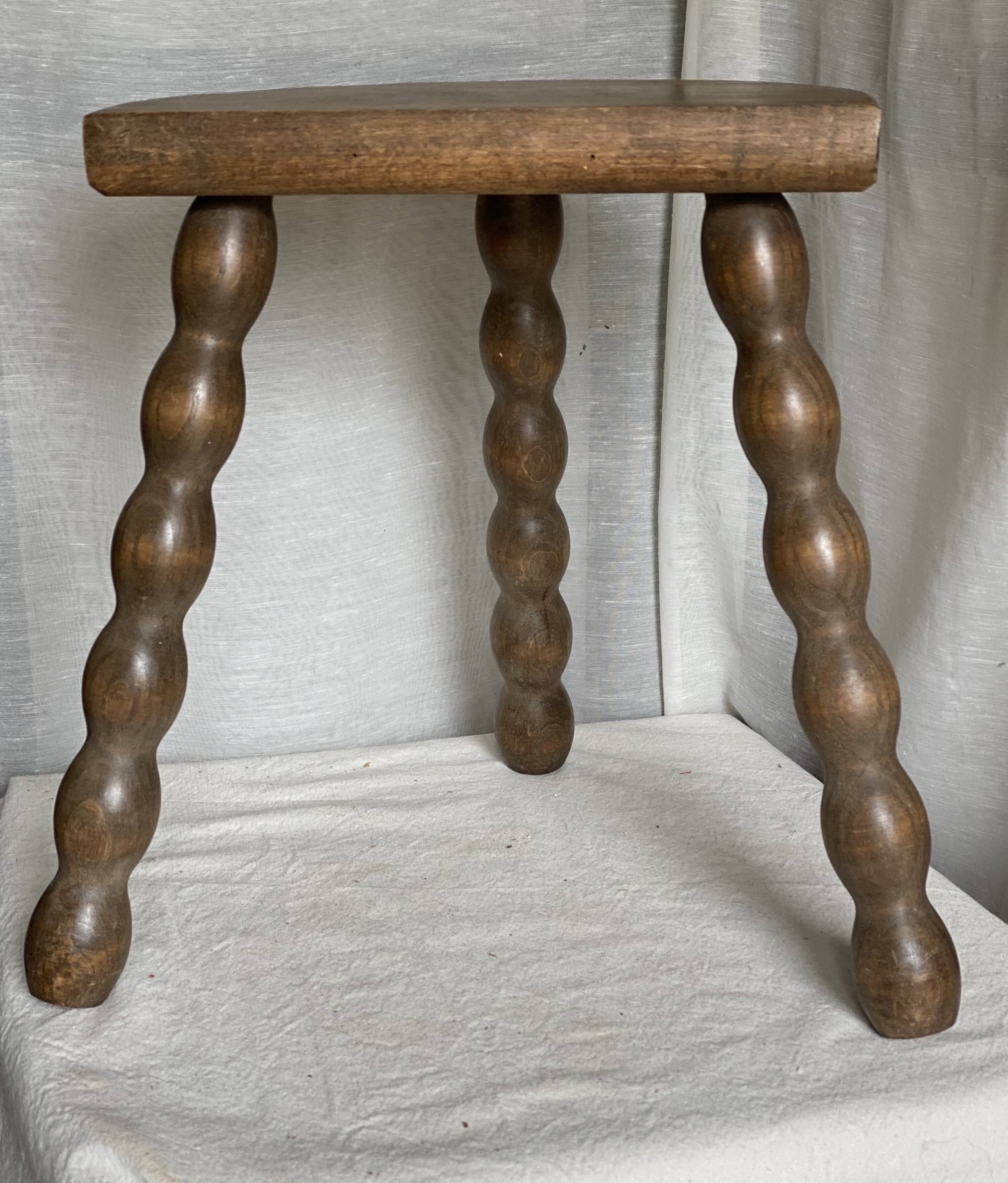 Vintage 1950s half-moon tripod stool