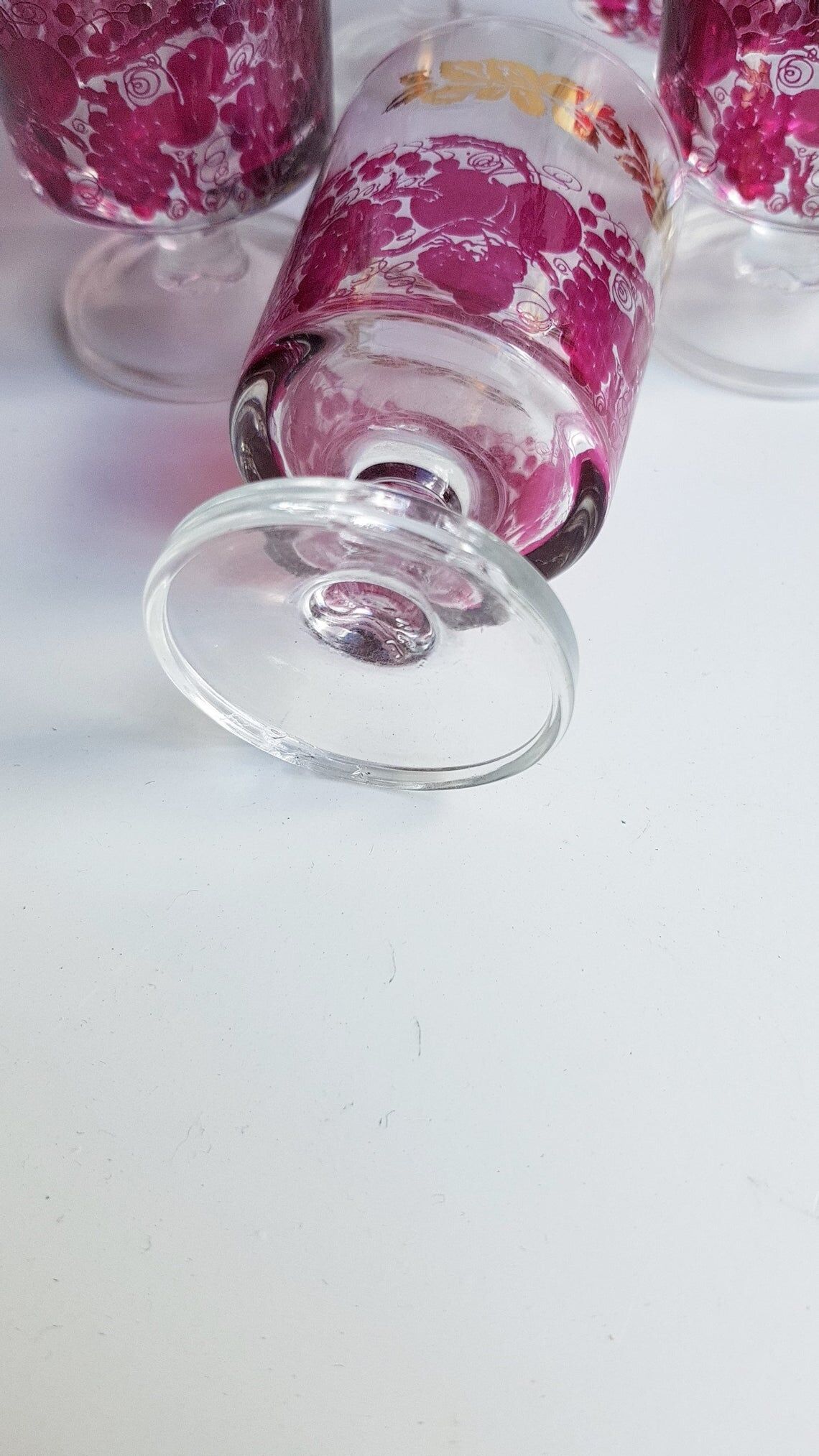 Pink and gilded glass liquor service