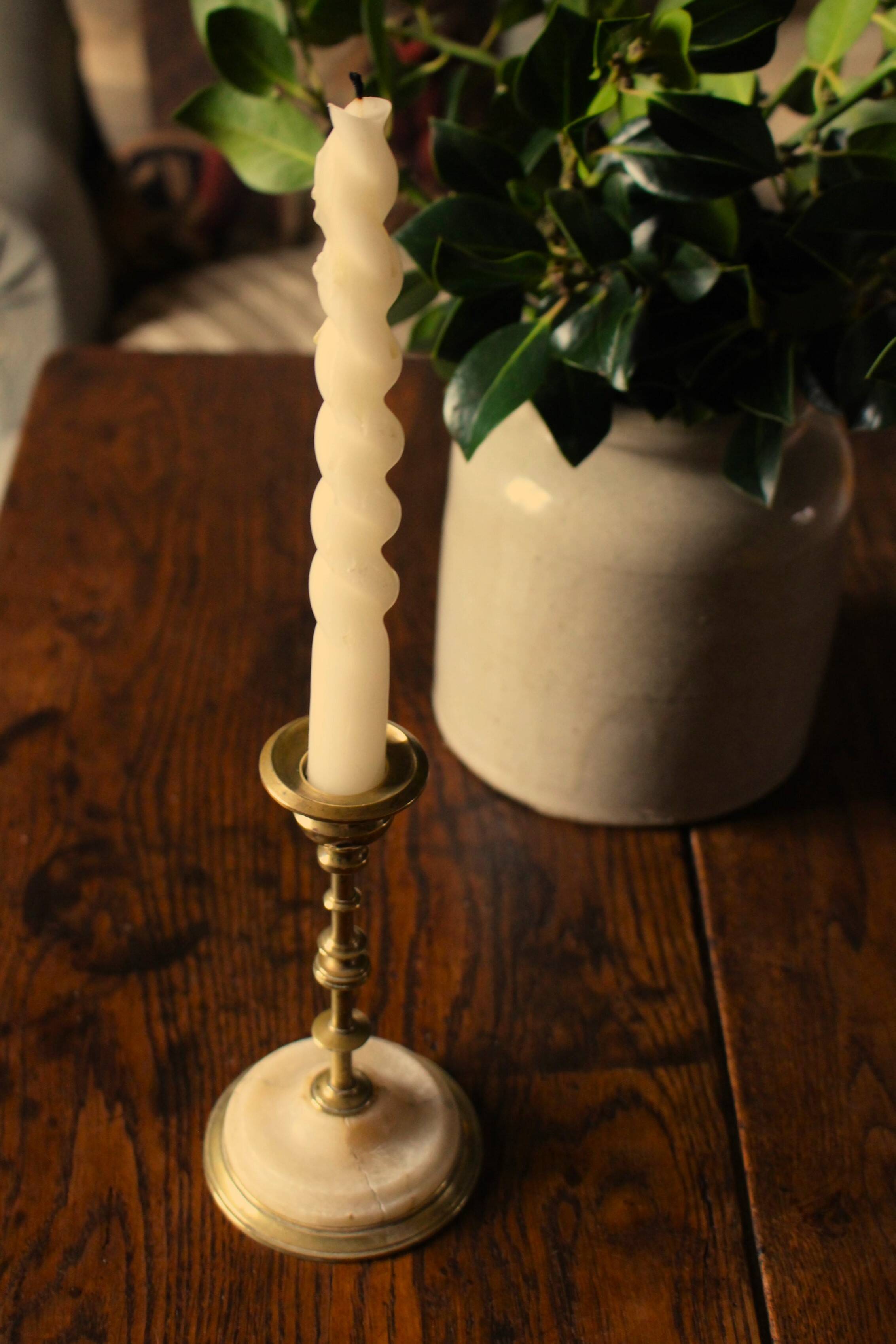 Fine brass candle holder alabaster base