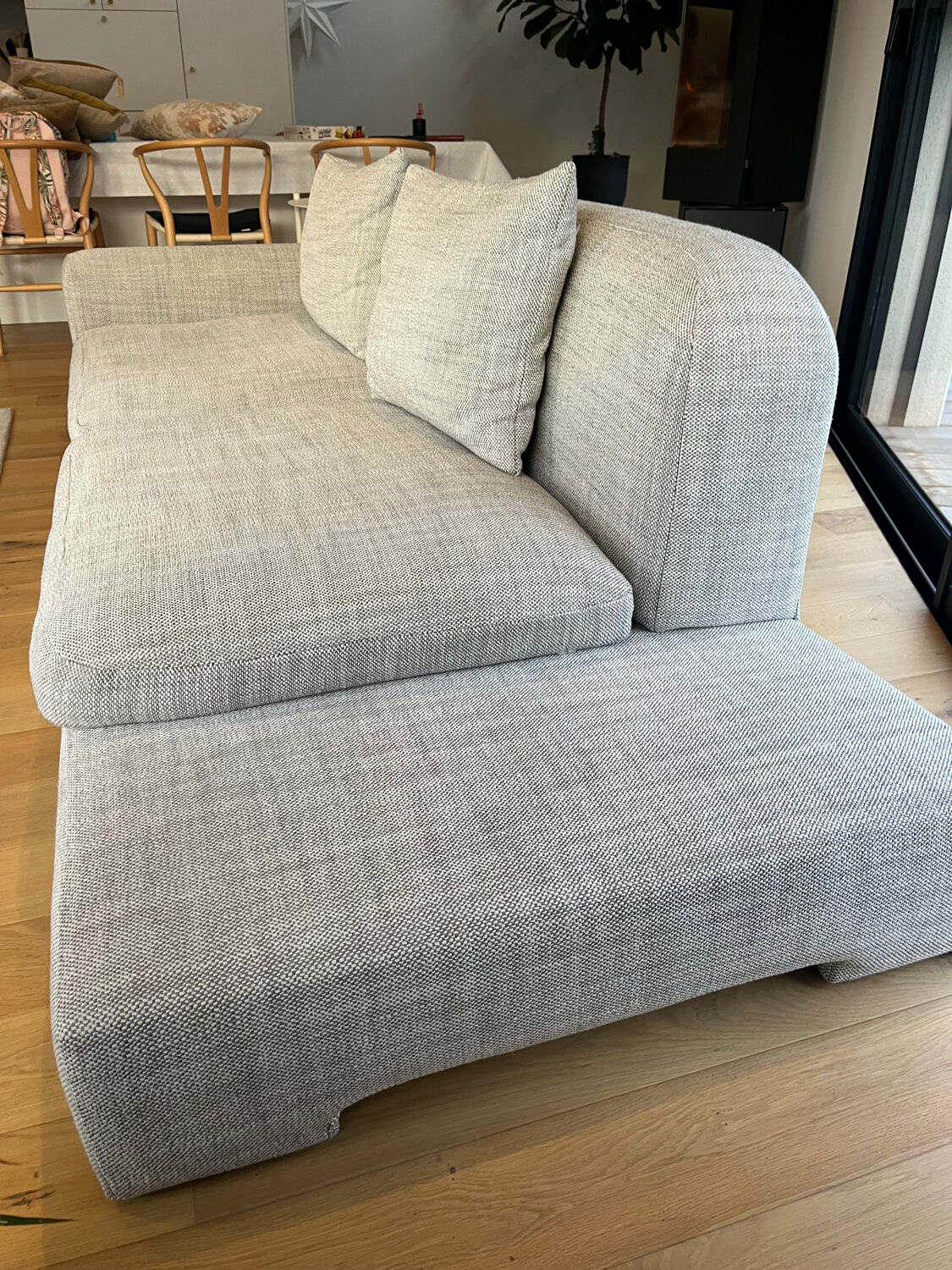 Three-seater fabric sofa