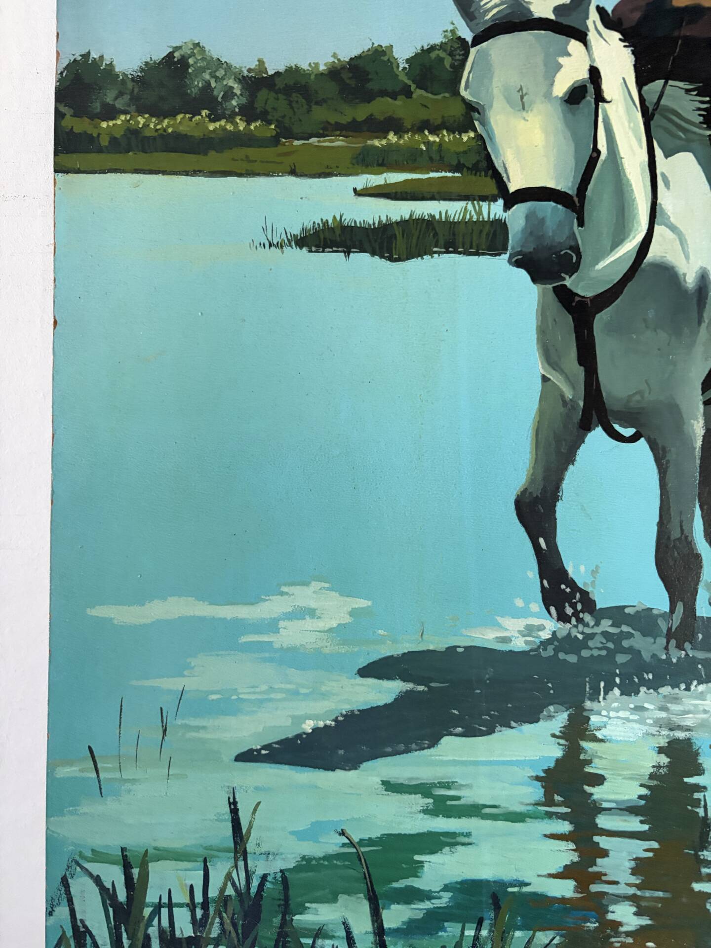 River crossing on horseback, on a sign by Campana.