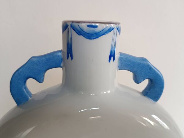 Vase en forme de gourde en porcelaine bleu blanc de Chine XIXème siècle