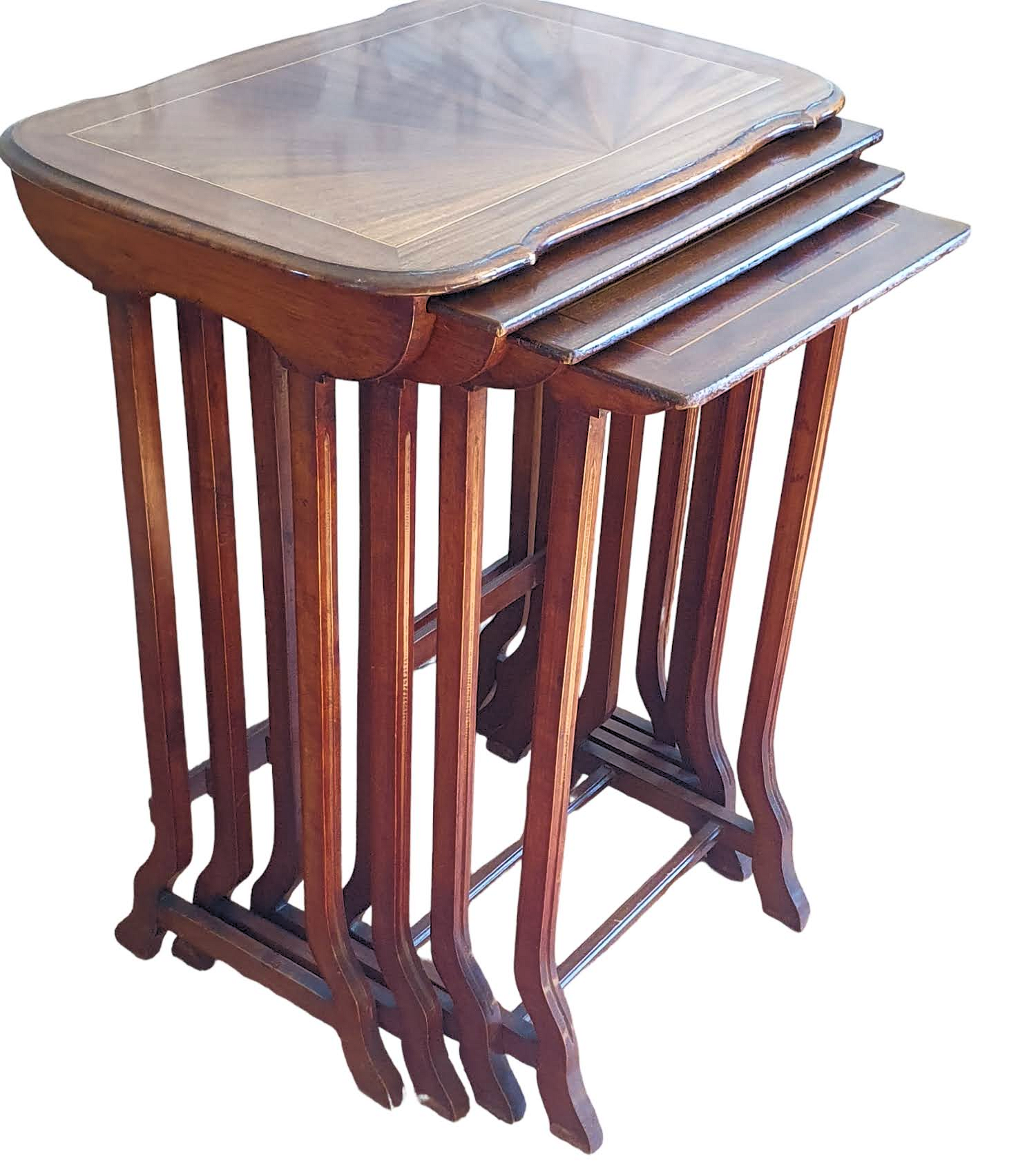 Suite of four nesting tables early twentieth century