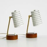 A pair of mid-century modern bedside lamps with perforated metal shades