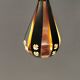 A teardrop-shaped pendant lamp made of copper, black metal, and prisms.