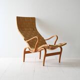 Fauteuil et repose-pieds « Pernilla » conçus par Bruno Mathsson