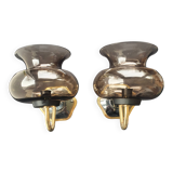 Pair of antique gold-plated brass and smoked glass wall lights.