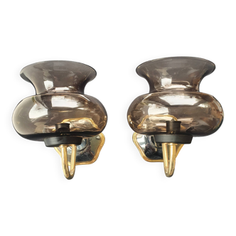 Pair of antique gold-plated brass and smoked glass wall lights.