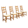 Four oak dining chairs by Henning Kjaernulf.