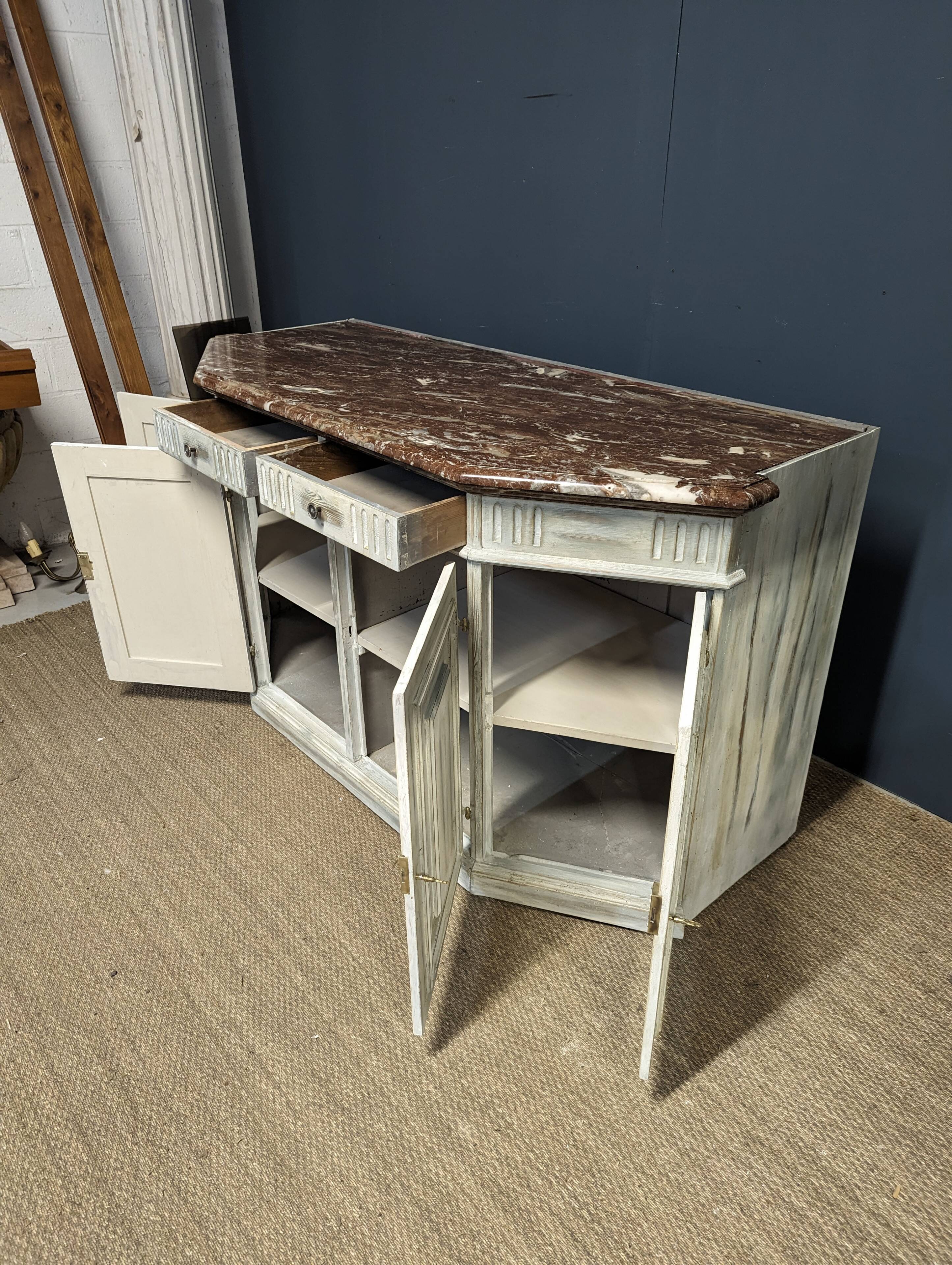 Low patinated sideboard with griotte marble top