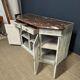 Low patinated sideboard with griotte marble top