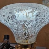 1970s table lamp in worked glass and gold metal