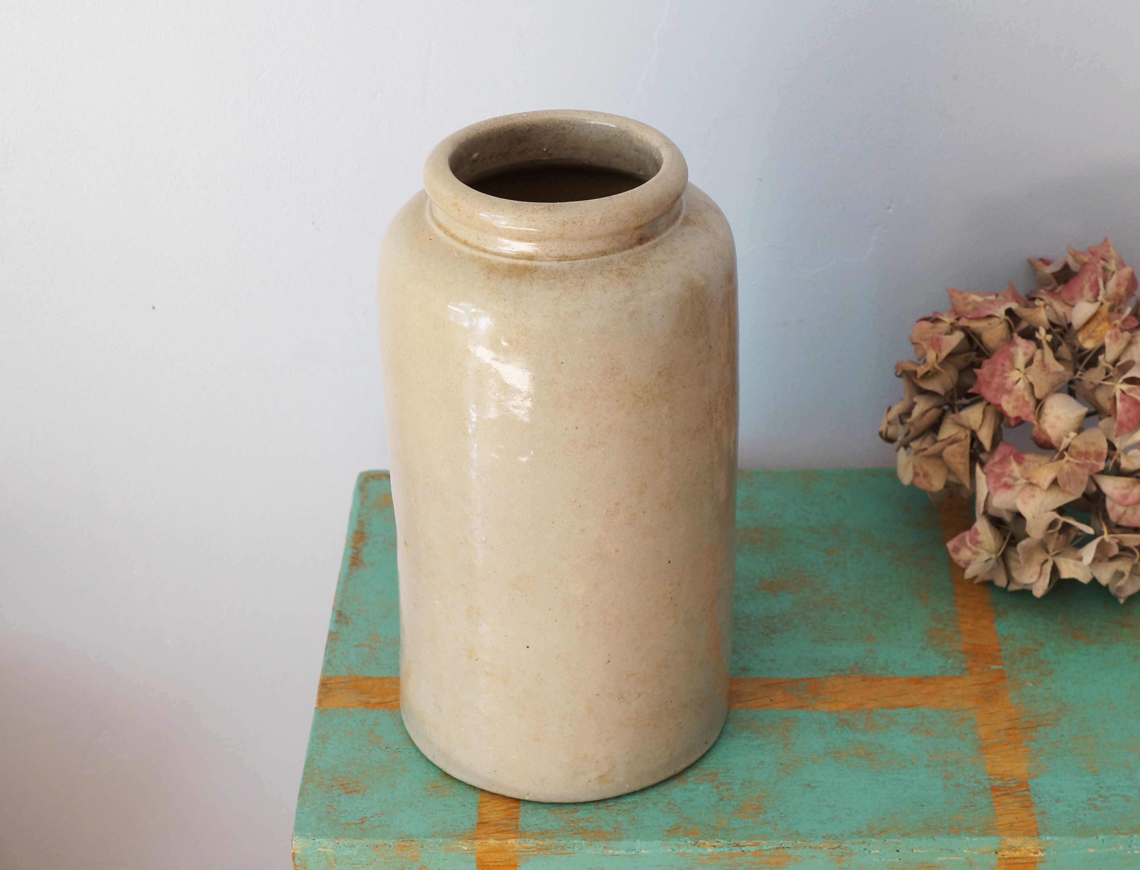 Old beige sandstone pot