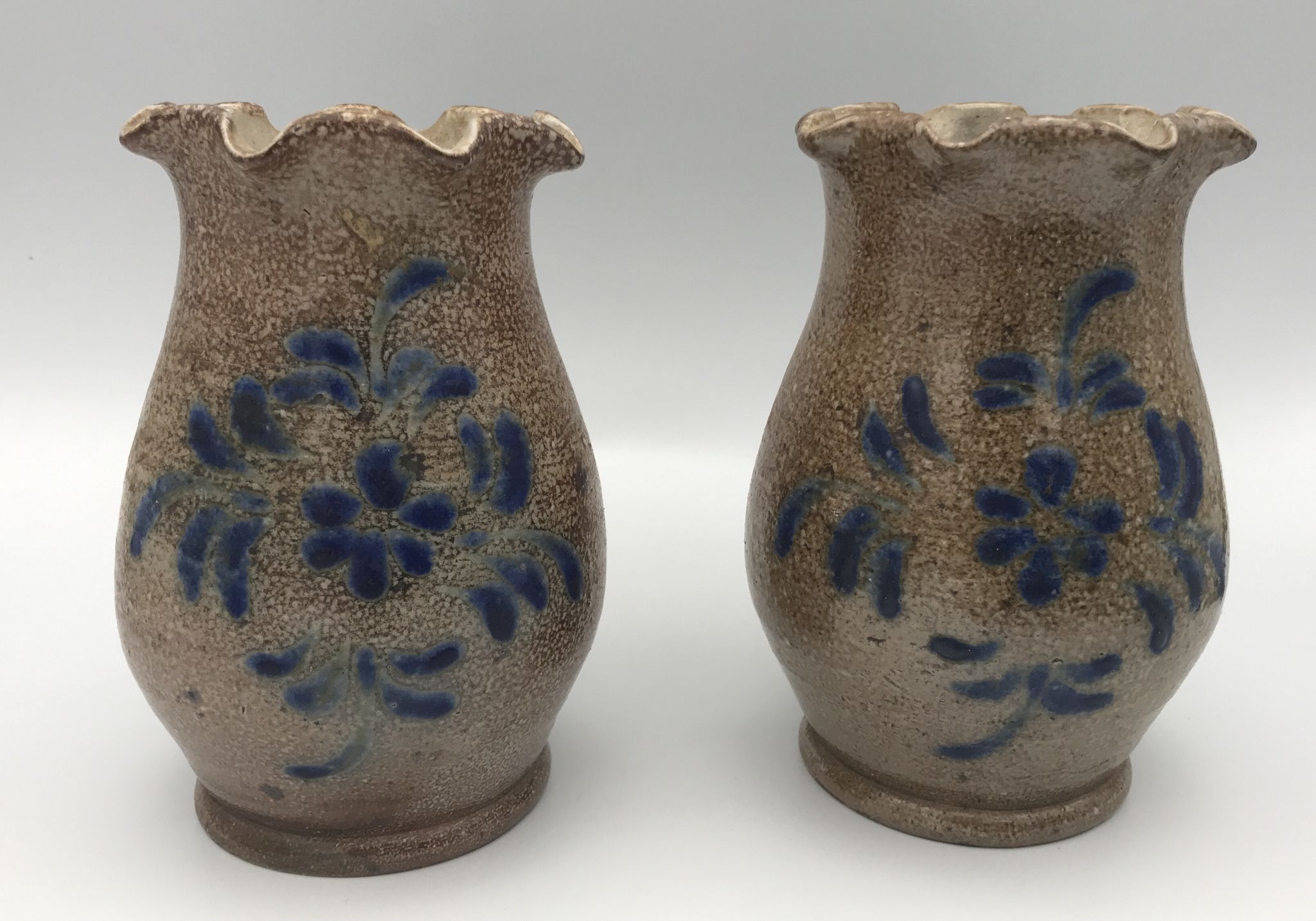 Pair of vintage pottery vases with floral decoration and glaçureau sel