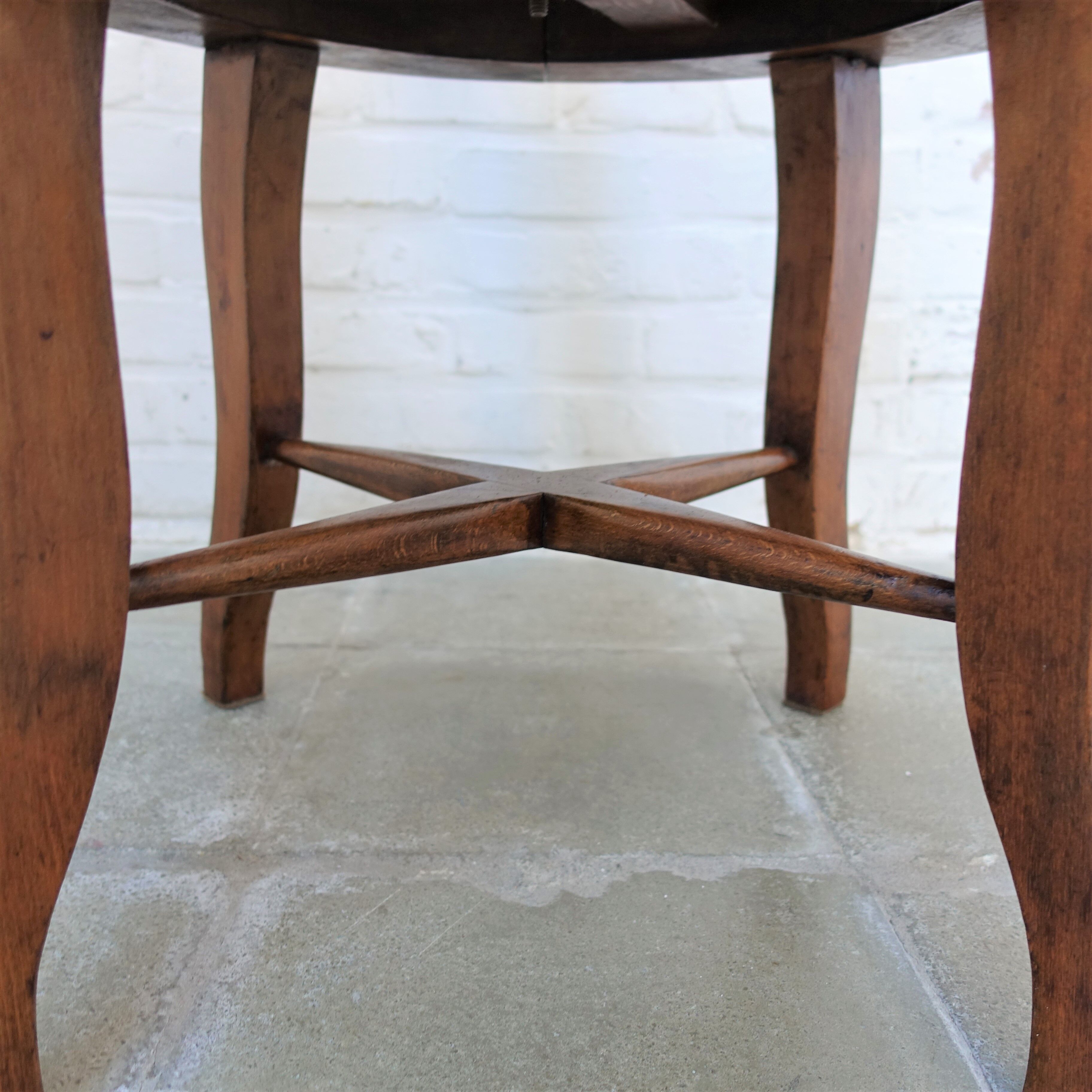 Antique oakwood barber armchair
