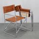 1970s pair of Italian folding chairs with leatherette upholstery