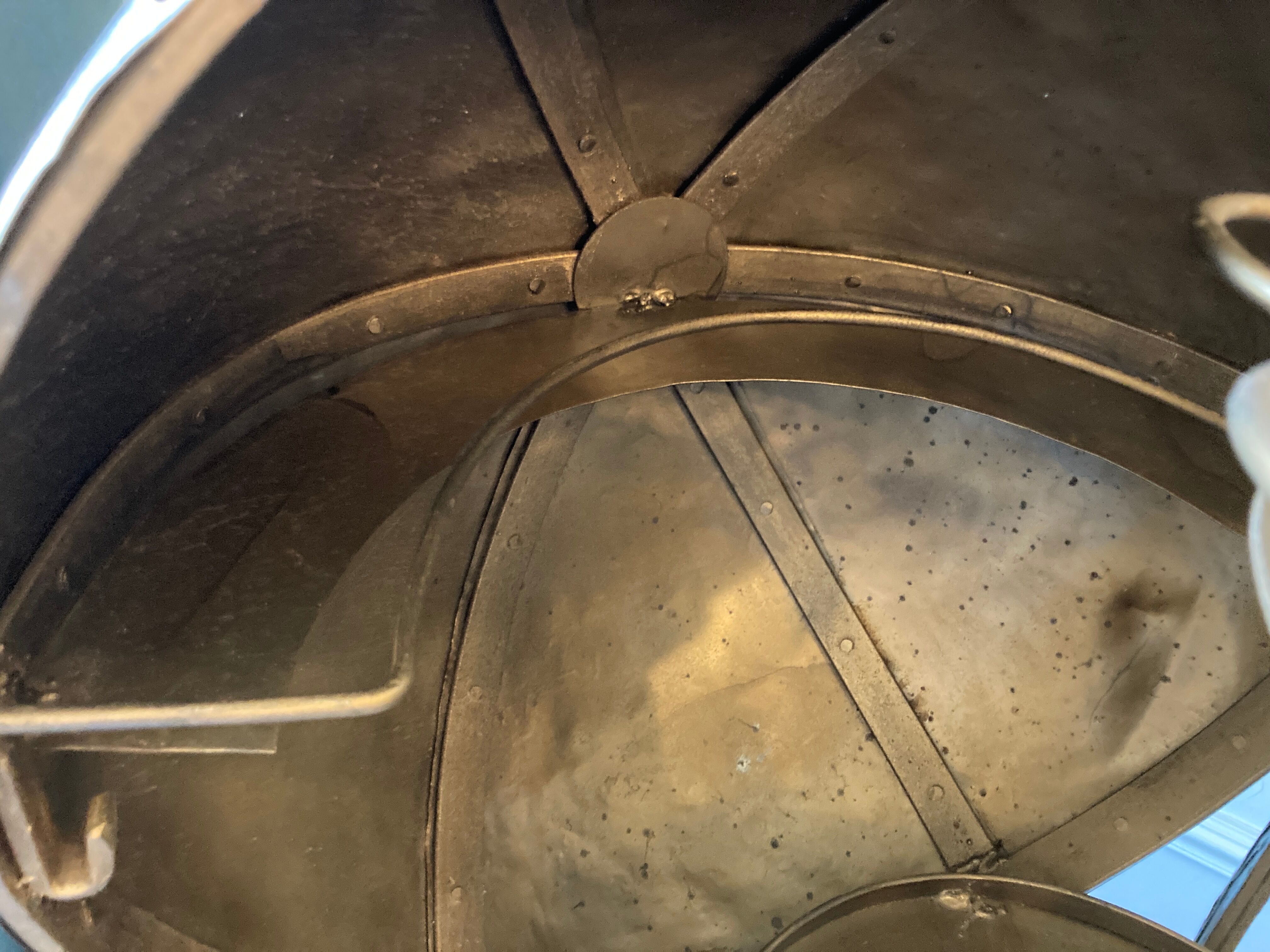 Atypical industrial furniture riveted sphere