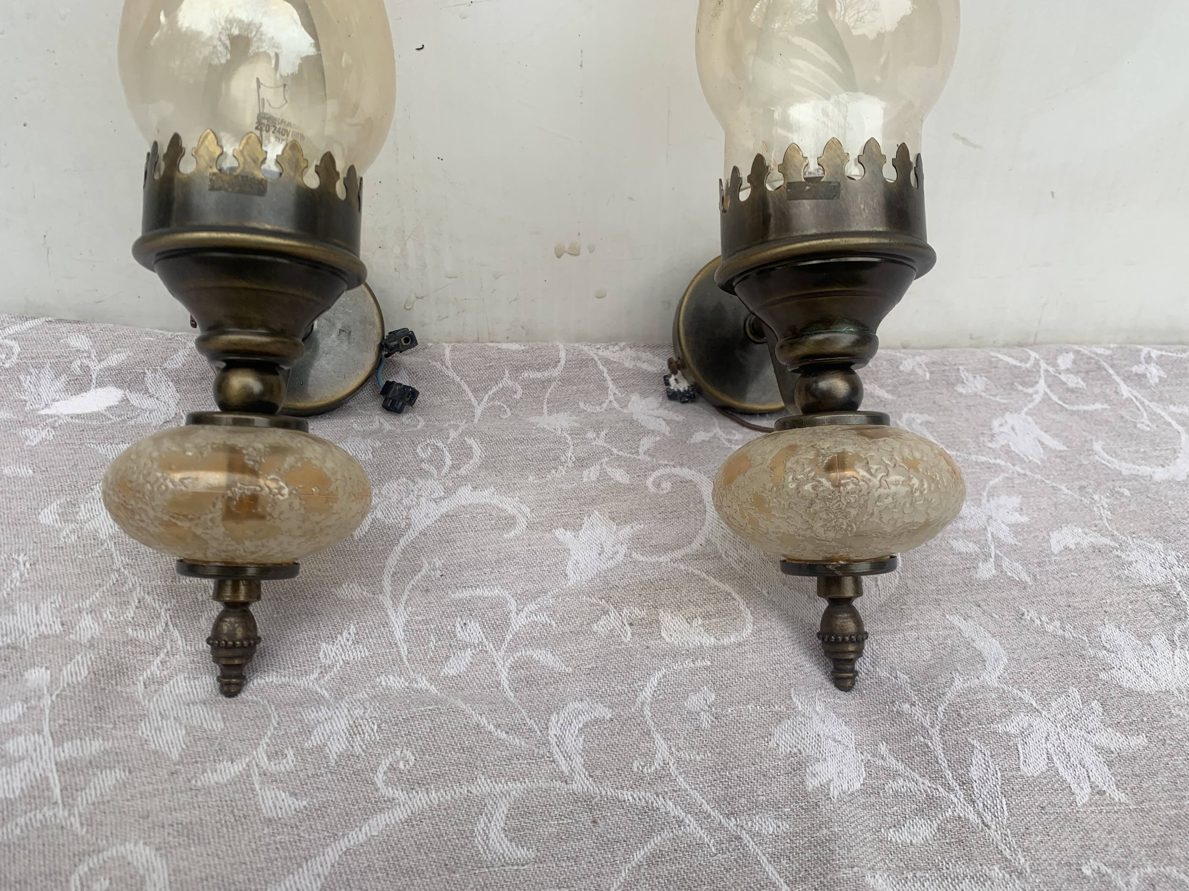Matching pair of bronze wall sconces oil lamp style