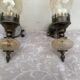 Matching pair of bronze wall sconces oil lamp style