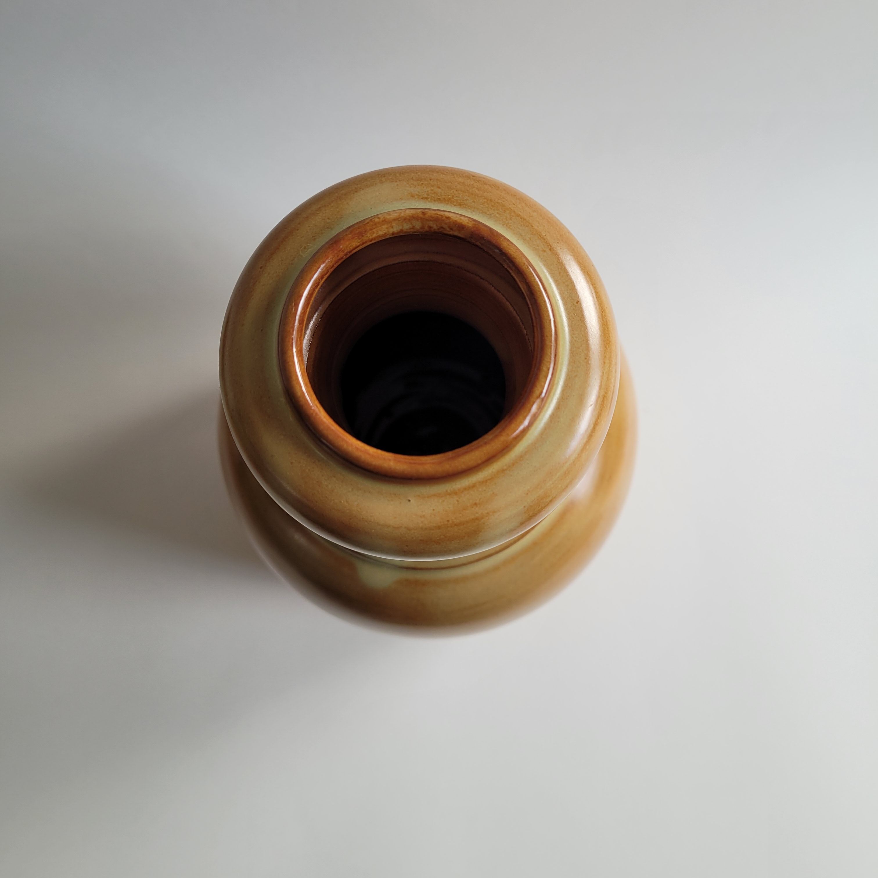 Enamelled sandstone vase