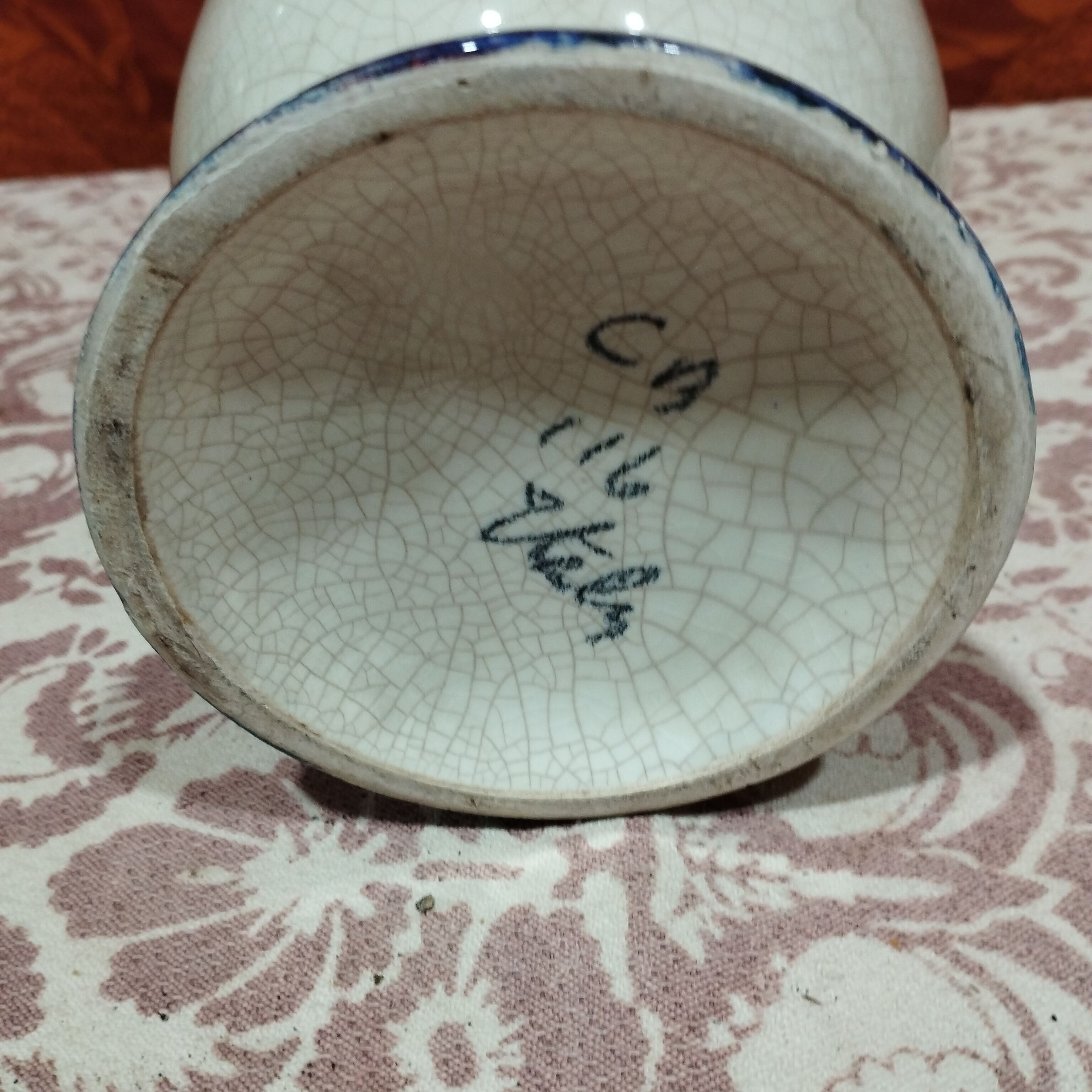 Hand-painted cracked ceramic pitcher