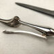 Leg service cutlery, silver punch Minerva