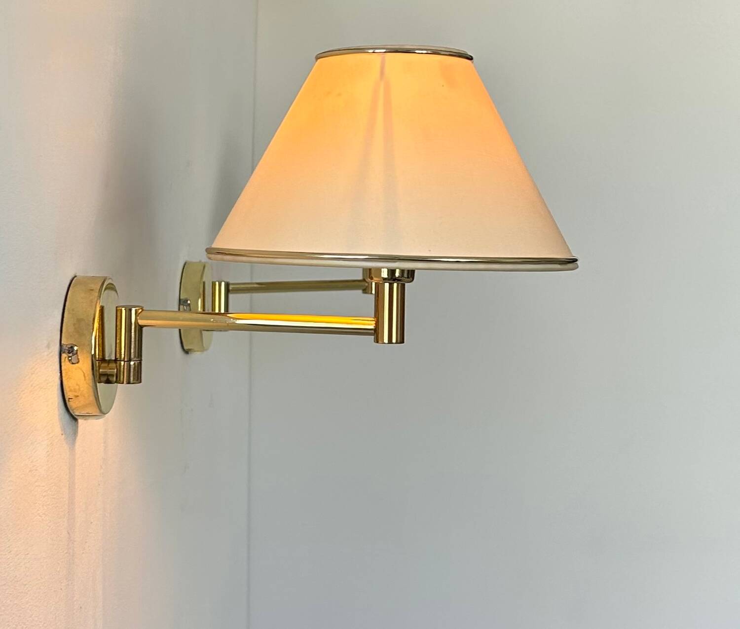 Vintage adjustable wall lamp, brass and beige fabric, France 1970