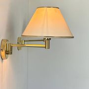 Vintage adjustable wall lamp, brass and beige fabric, France 1970