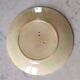 Old flat slip plate from Onnaing with floral decoration