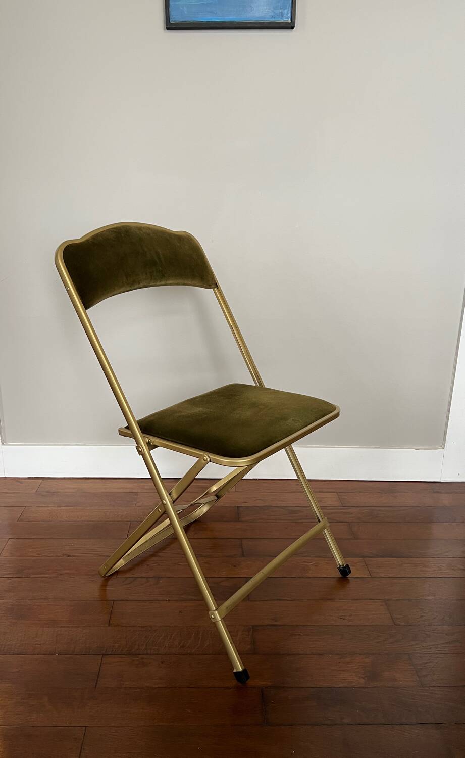 Green velvet folding chair
