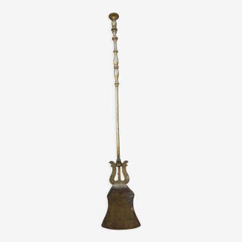 Old brass fire shovel