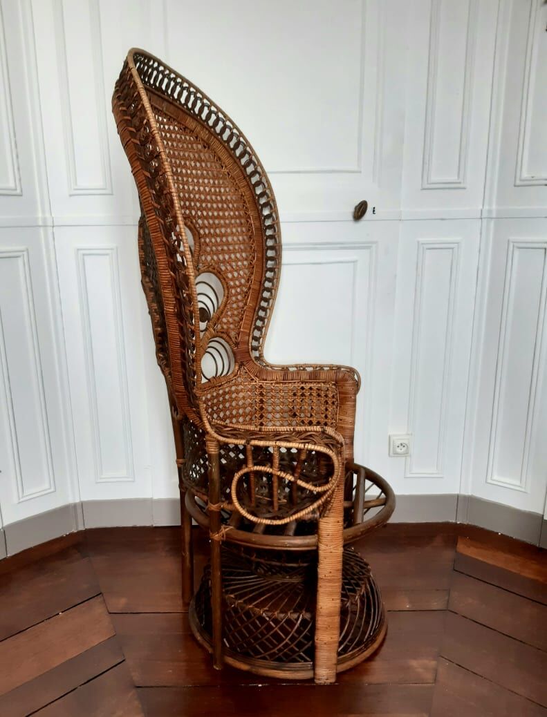 Peacock rattan armchair, circa 1960