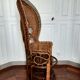 Fauteuil peacock en rotin , vers 1960