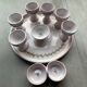 Egg cups, 9-piece service by Michel Spire