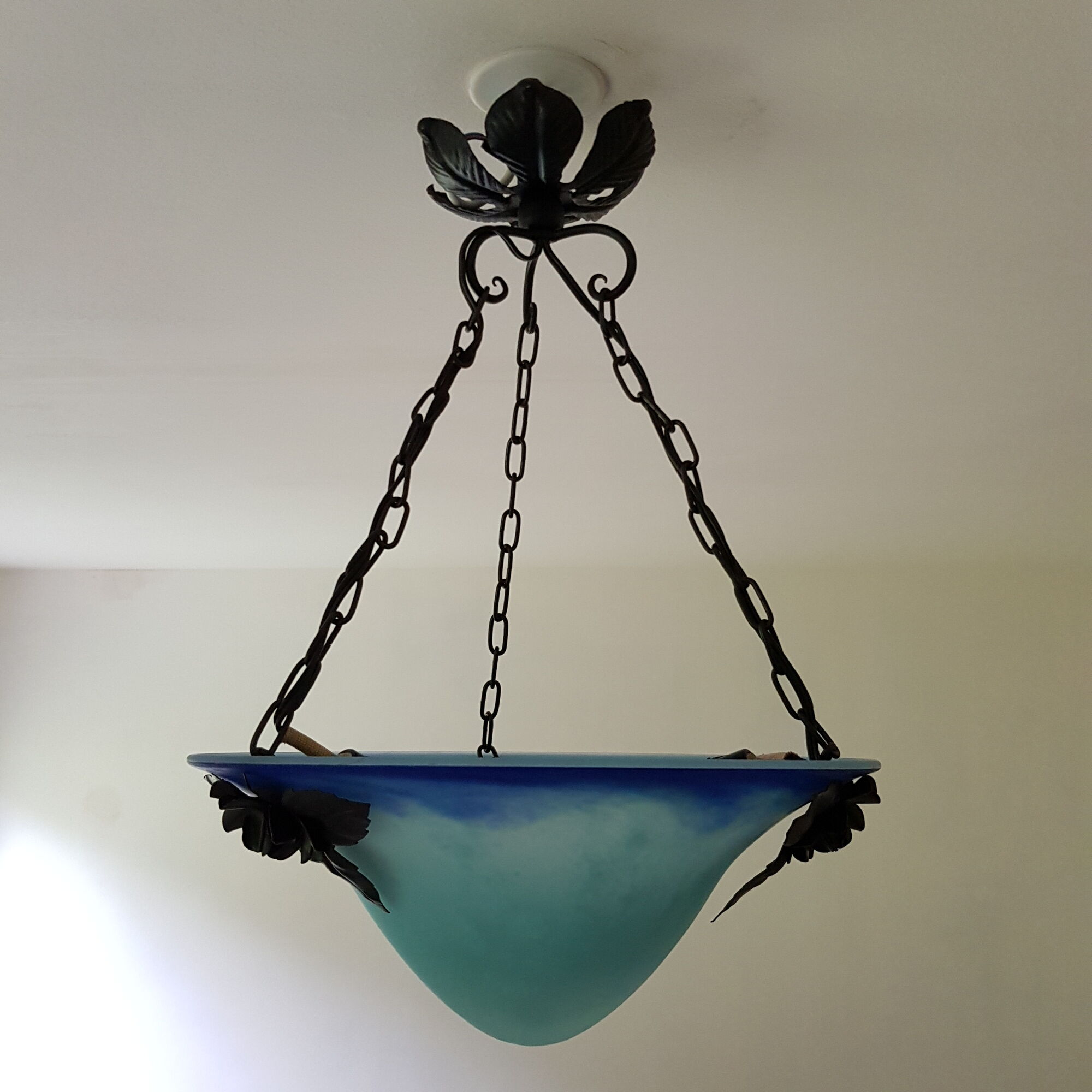 Blue glass paste and wrought iron basin suspension
