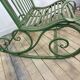 Rocking-chair en fer forgé vert patiné