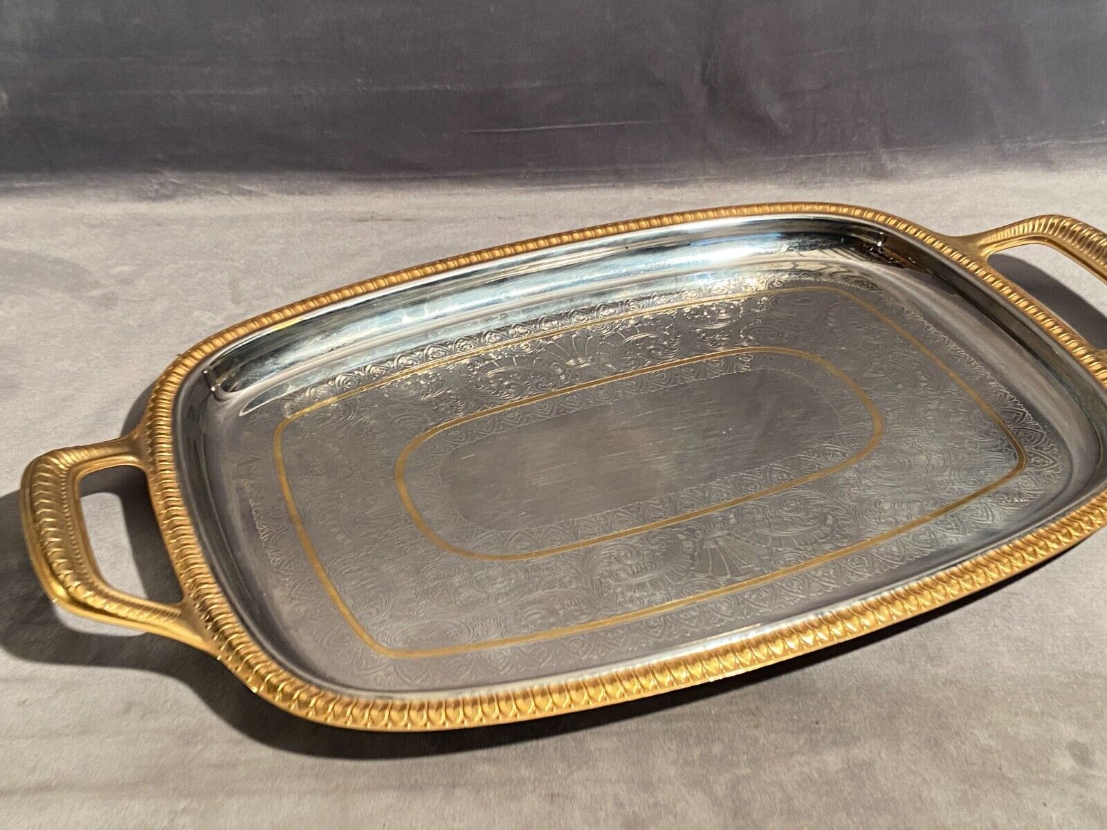 Top with stainless steel handles and gilded Regency style nets
