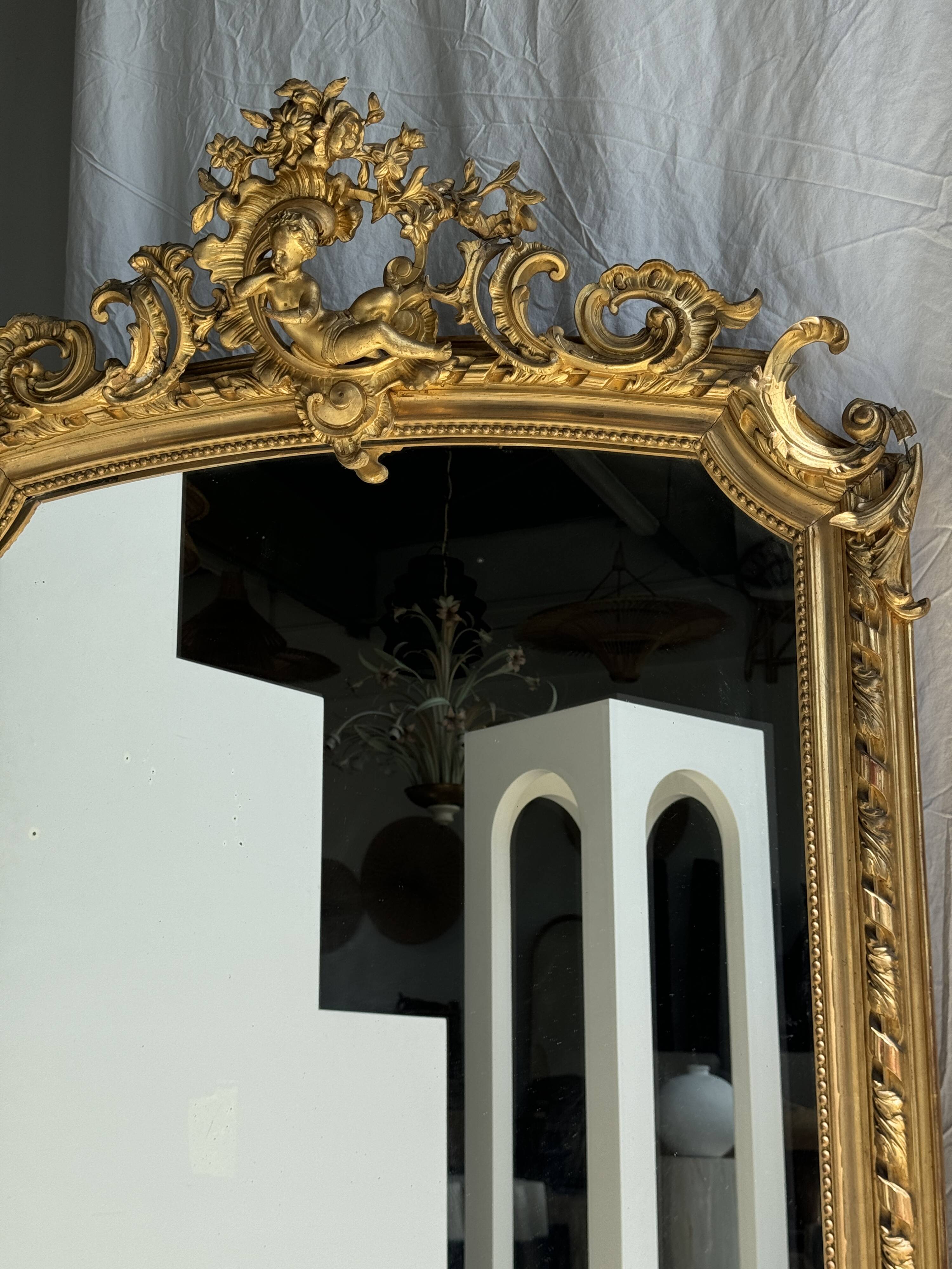 Large gilded mirror with acanthus leaf pediment H150 L98