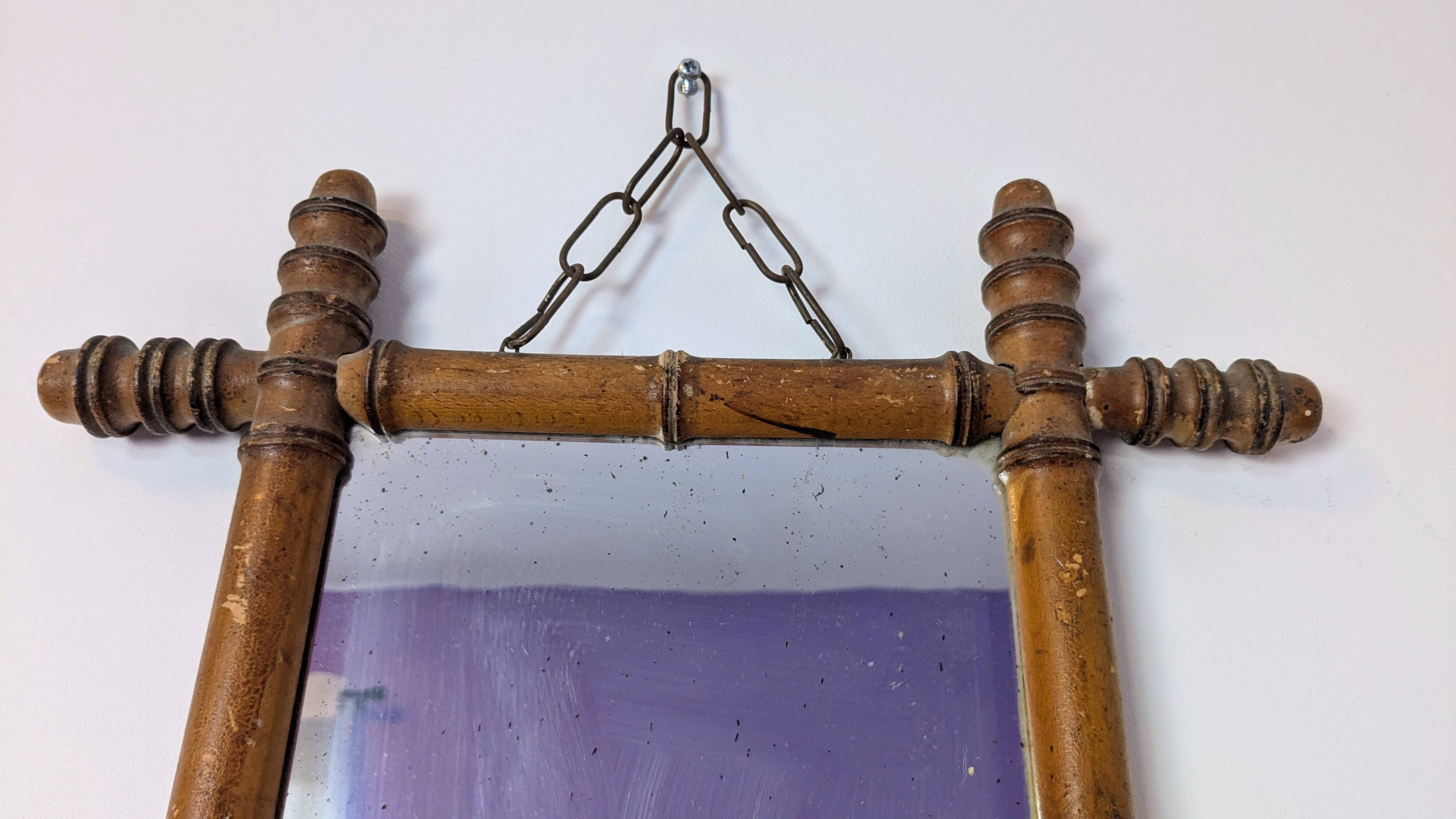 Antique turned bamboo mirror with pitted glass 45x39 cm