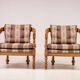 Pair of Giorgetti "1975 Gallery" armchairs in carved wood, original upholstery.