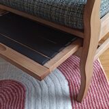 Relaxing armchair with integrated ottoman