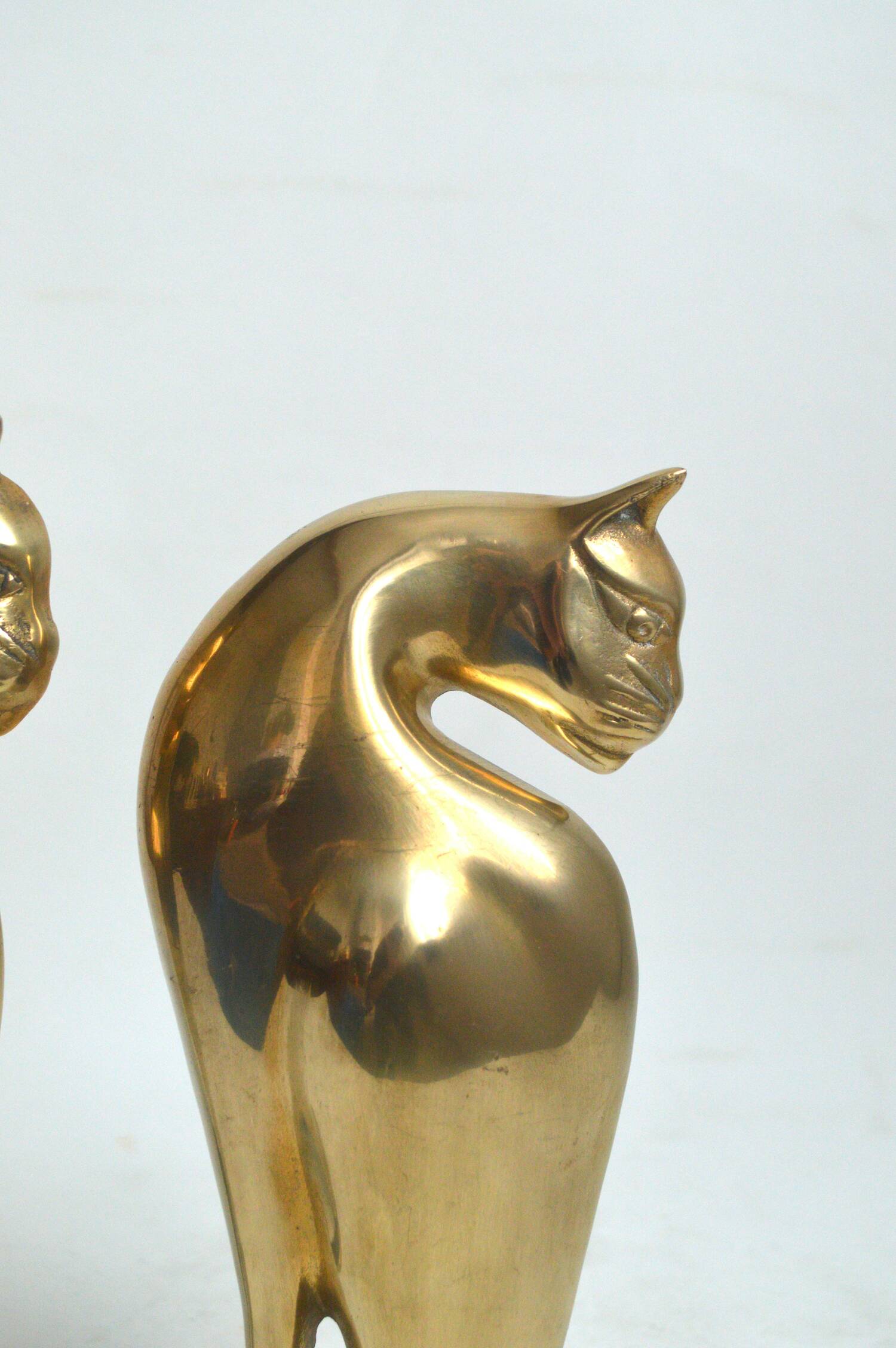 Feline brass bookends
