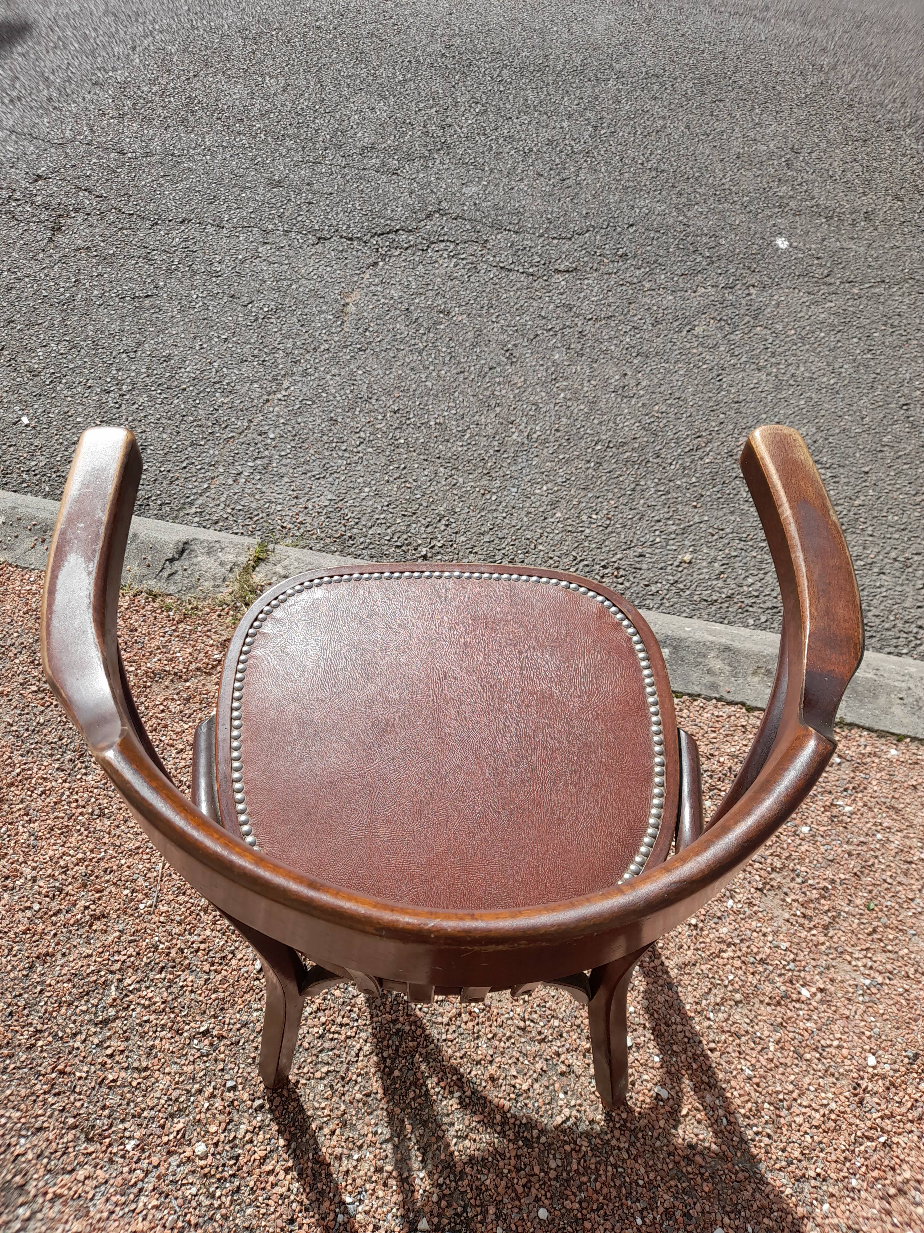 Pair of bistro armchairs signed Baumann 1930